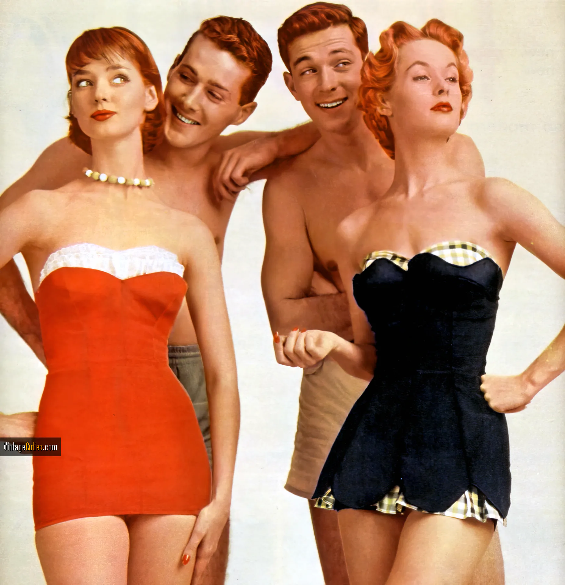 Two amazing retro girls with two guys standing behind them
