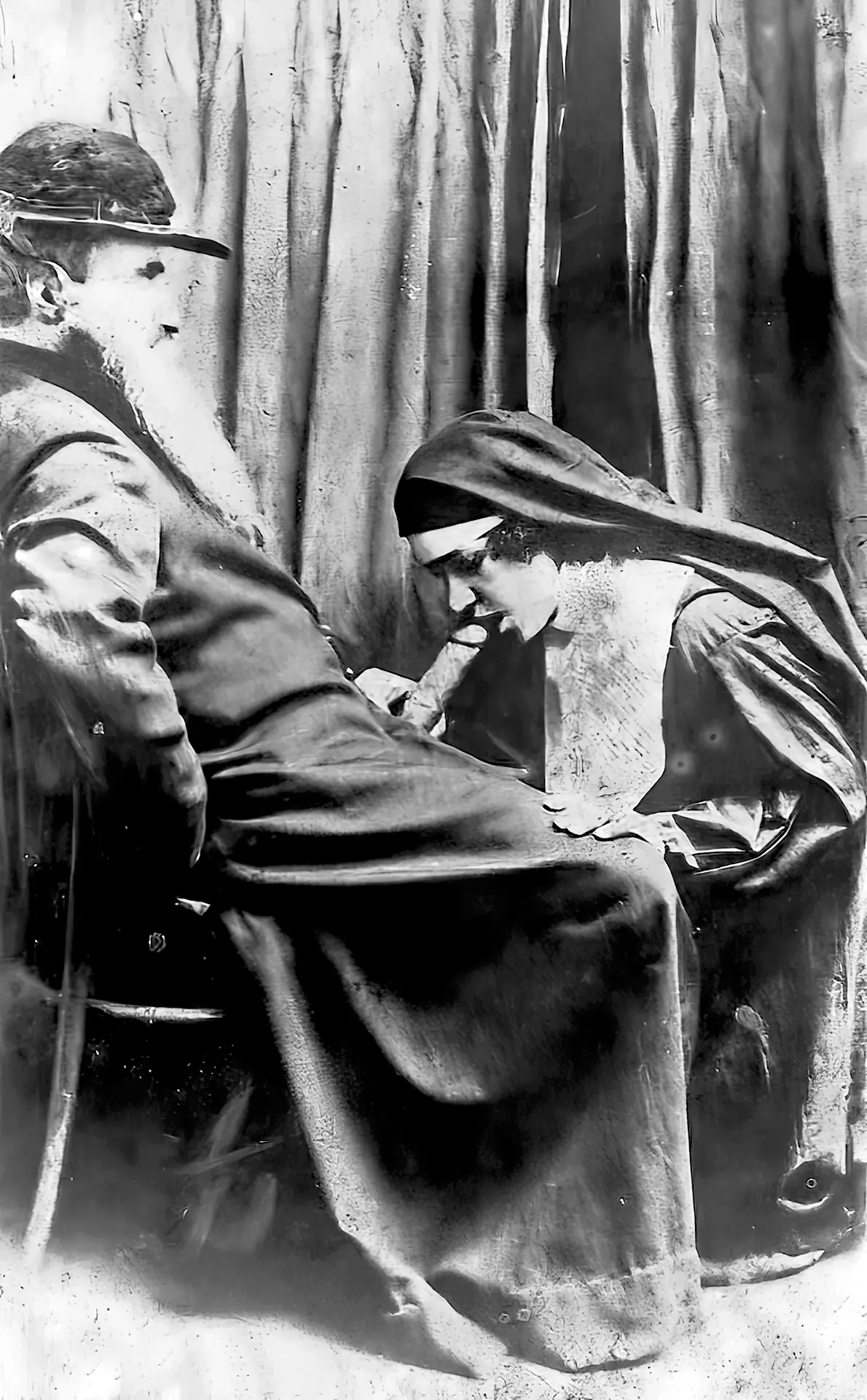 Vintage nun porn photos with an old priest getting his big cock sucked by a devoted kneeling nun as he's sitting on a chair