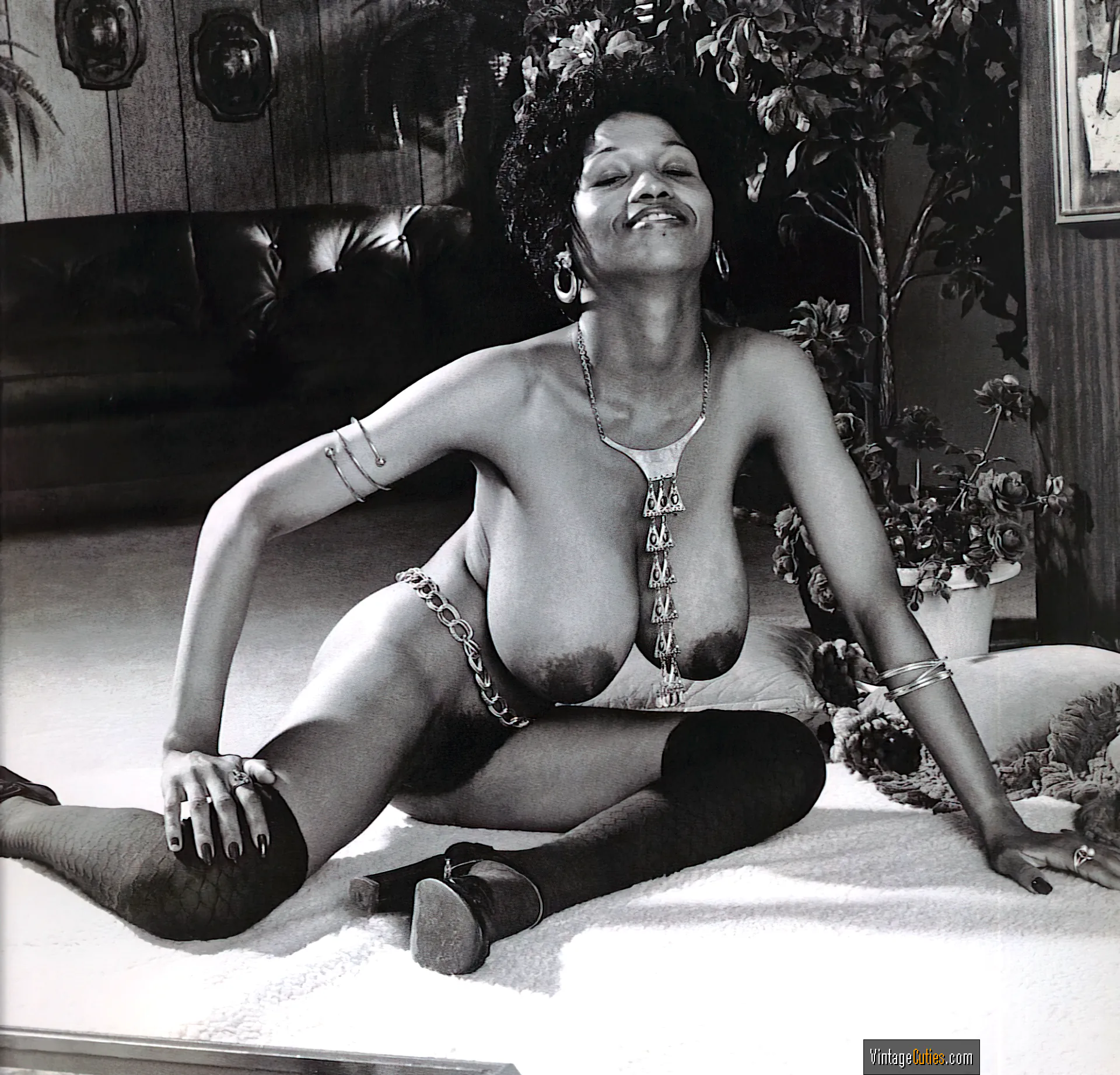 Alluring Sylvia McFarland with saggy breasts wearing jewelry
